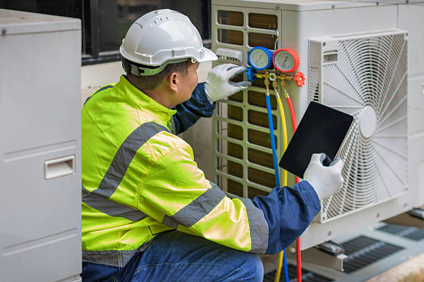 Professional Ductwork Repair technician working in Brainard, NY